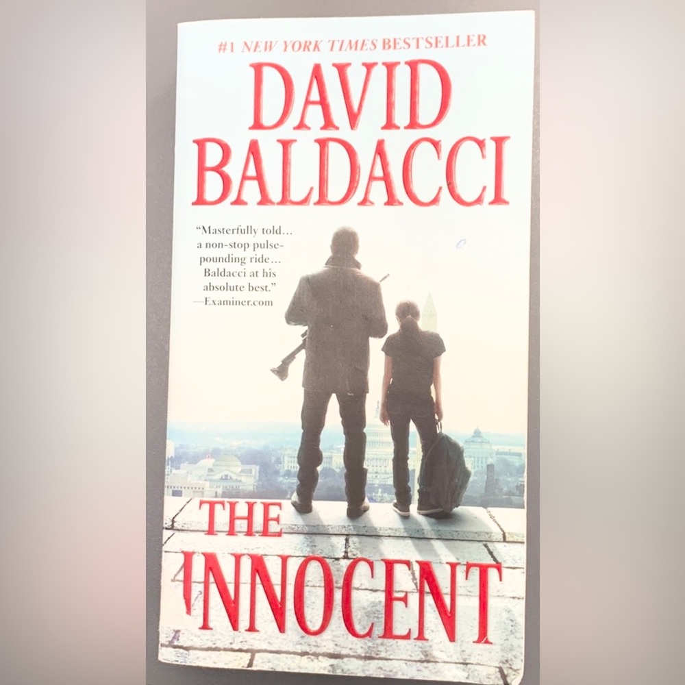 (3 for $20) David Baldacci Two novels, The Innocent and Stone Cold